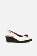 Mocasín de Piel Coco Blanco y Negro Borlas